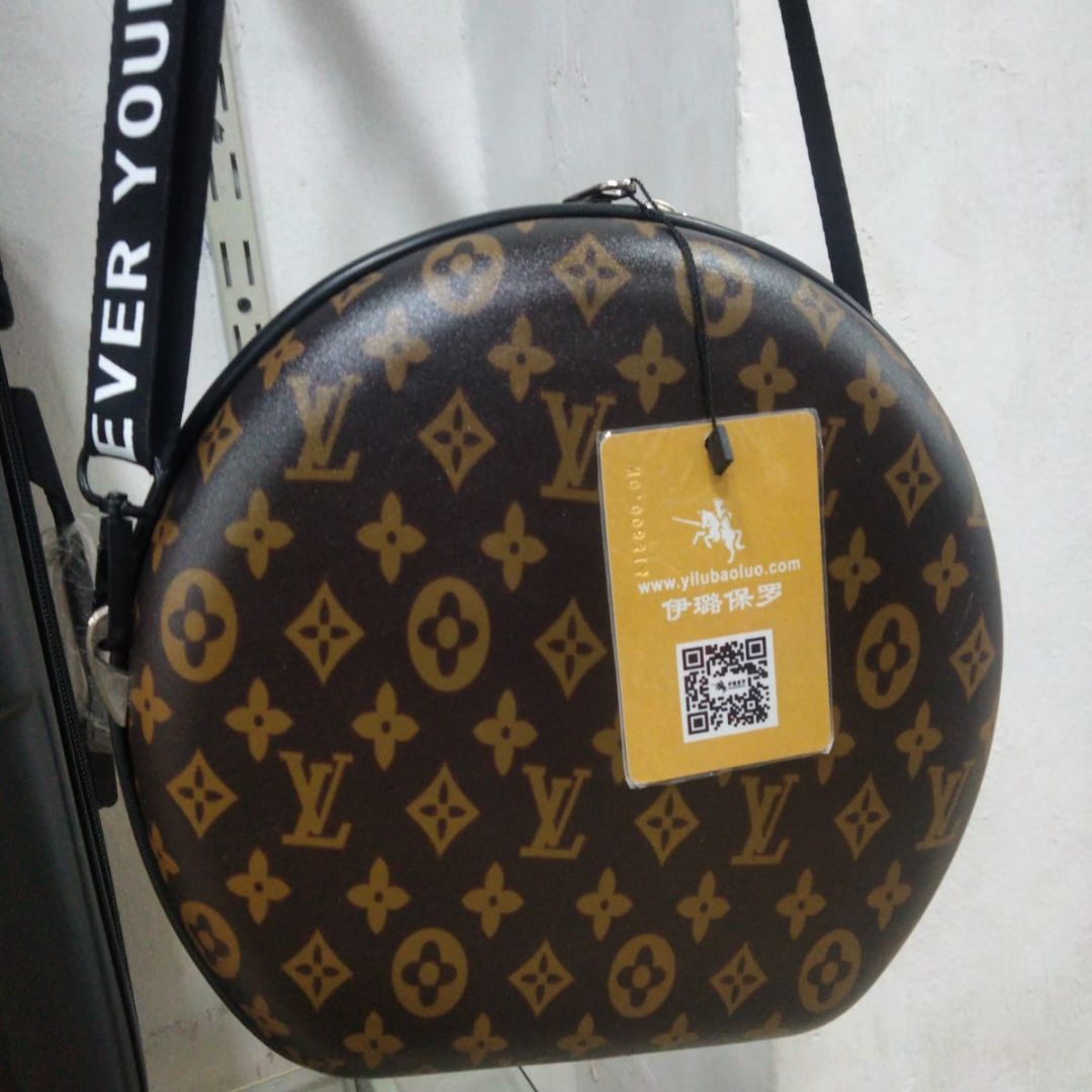 Round shape branded crossbody bag for girls