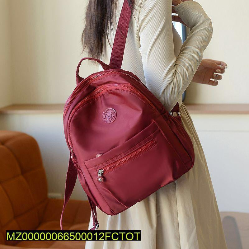Plane front zipper casual backpack